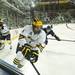 Michigan defensive player Kevin Clare skates with the puck on Tuesday. Daniel Brenner I AnnArbor.com